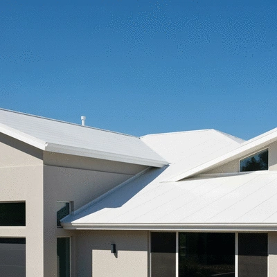 Modern home with a newly installed roof, clean lines, and blue sky, symbolizing enhanced resale value